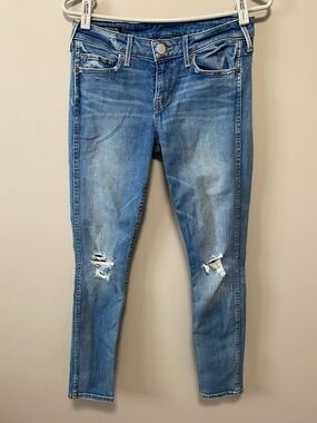 True Religion Distressed Skinny Jeans in Medium Blue